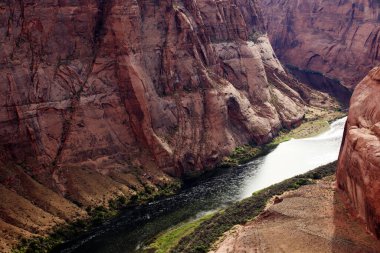 Page, Arizona / USA - August 05, 2015: Horseshoe Bend seen from the lookout point, Colorado river, Page, Arizona, USA