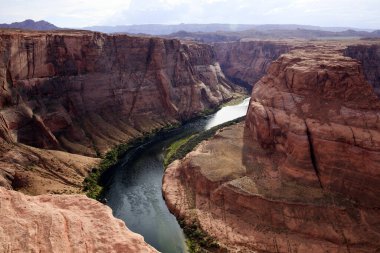 Page, Arizona / USA - August 05, 2015: Horseshoe Bend seen from the lookout point, Colorado river, Page, Arizona, USA