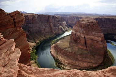 Page, Arizona / USA - August 05, 2015: Horseshoe Bend seen from the lookout point, Colorado river, Page, Arizona, USA