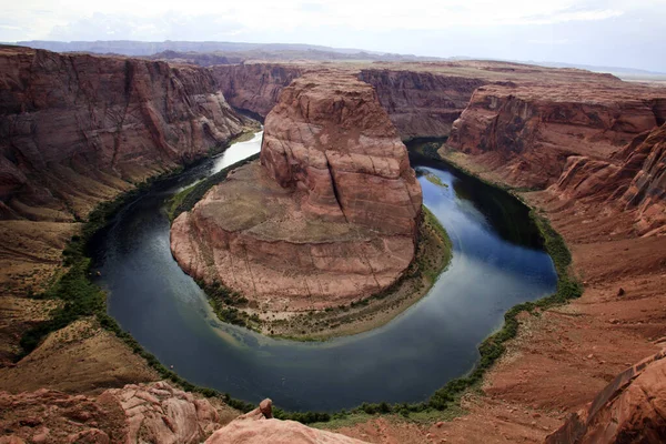 Page, Arizona / USA - August 05, 2015: Horseshoe Bend seen from the lookout point, Colorado river, Page, Arizona, USA