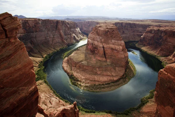 Page, Arizona / USA - August 05, 2015: Horseshoe Bend seen from the lookout point, Colorado river, Page, Arizona, USA