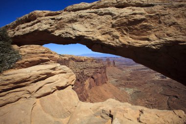 Utah / USA - August 11, 2015: Rock arc at Island In The Sky Canyolands National Park, Utah, USA