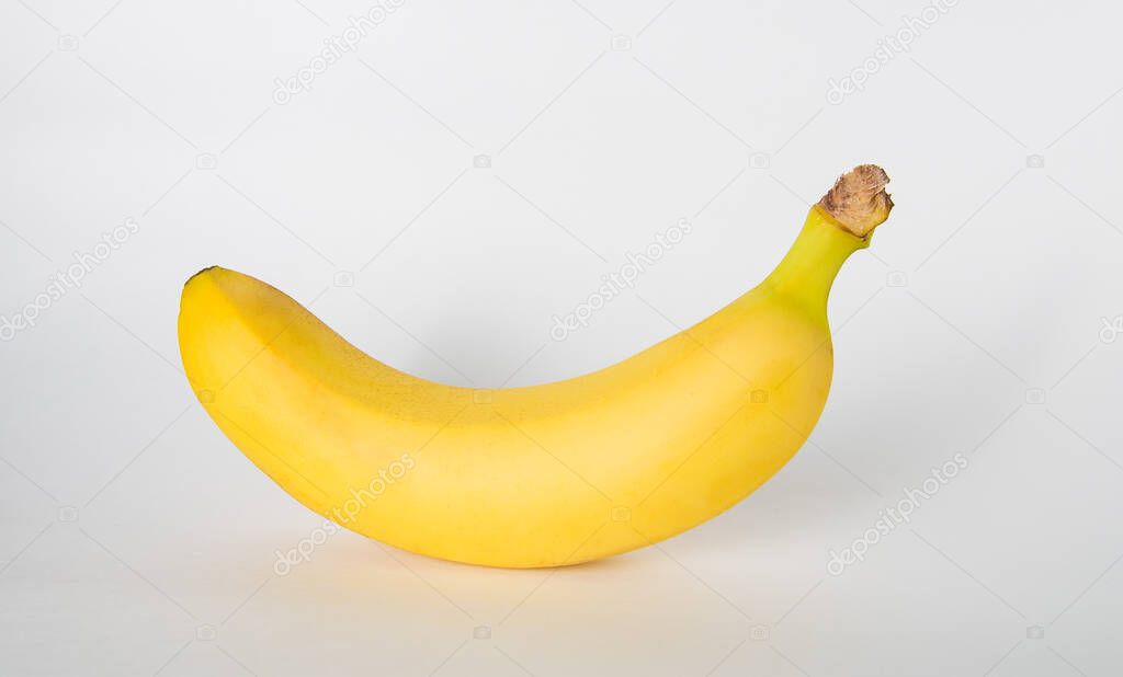 one banana on a white background