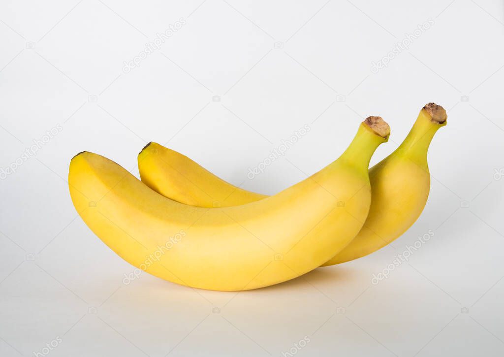 two clean bananas on a white background