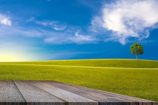 Old Wooden Floor Green Field Slope Tree Blue Sky Clouds Stock Image