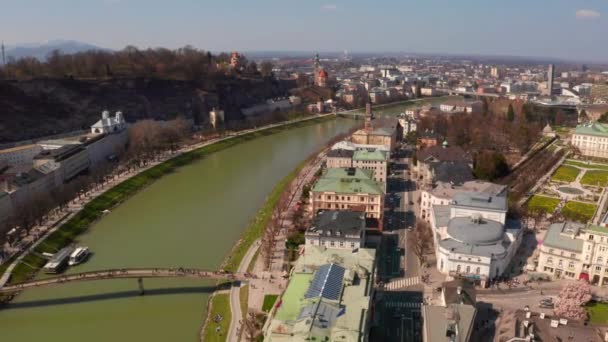 Flying over the historic city of salzburg with salzach river — Stock Video