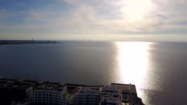 Aerial view from the malmo western harbour on the sunset and the bridge to copenhagen — Stock Video