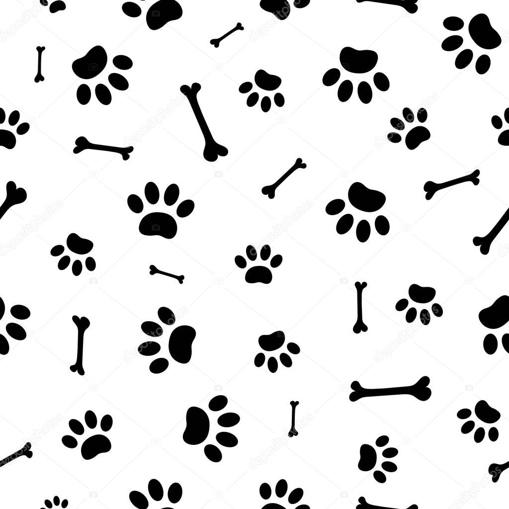 Seamless pattern of black paw prints and bones.