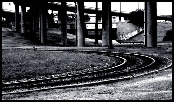 Tram Tracks Loop Bend Black White Viaduct Construction Poles — Stockfoto