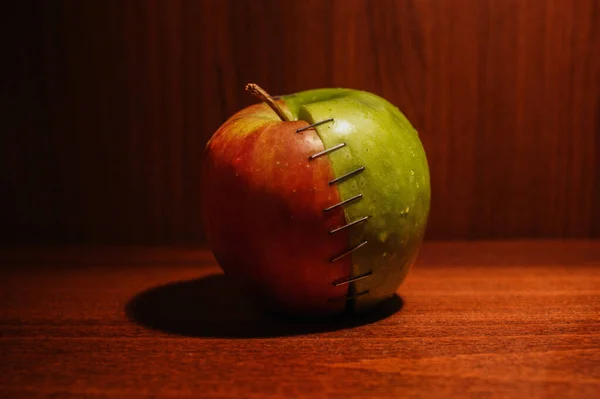 Green Red Apple Stapled Two Halves Mismatched Love — Stock Photo, Image
