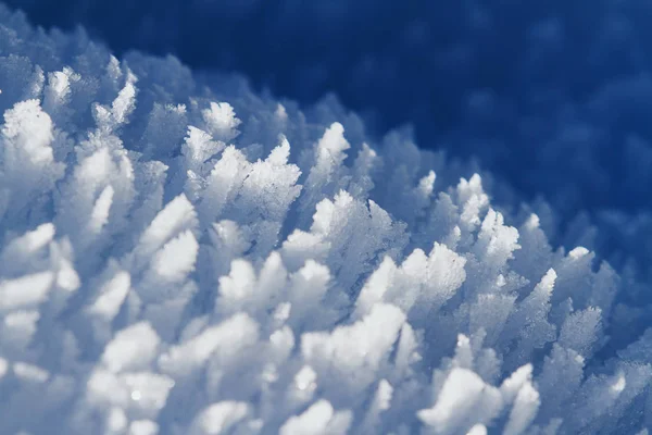 Ice crystals, tinted in blue, background — Stock Photo, Image