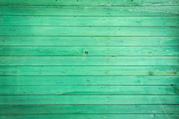 Зеленый старый деревянный фон, окрашенная текстура дерева — стоковое фото