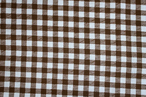 Checkered background, Empty table covered with checkered tablecloth