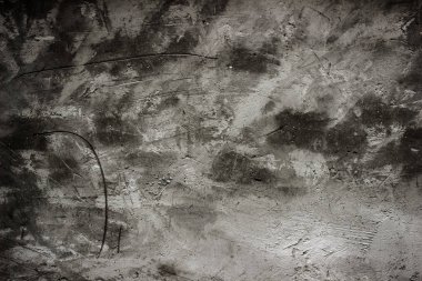 Karanlık bir arka plan üzerinde betonun dokusuna