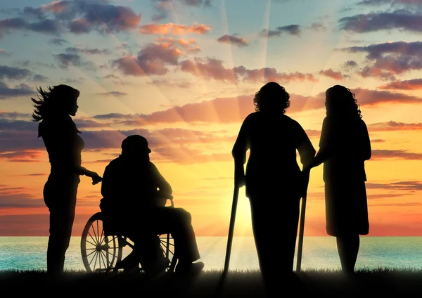 Σιλουέτα των δύο ανθρώπων με αναπηρίες και Ηδονοβλεψίες — Φωτογραφία Αρχείου