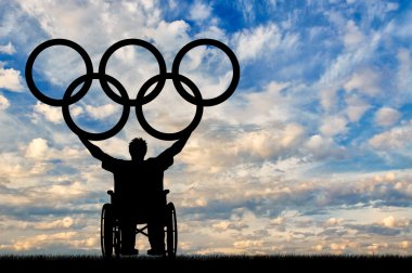 Paralimpik tekerlekli sandalye tutun olimpik halka bizzat devre dışı