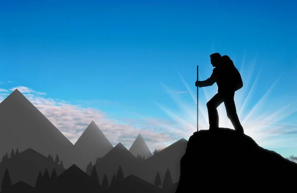 Mannelijke klimmer boven op een berg — Stockfoto