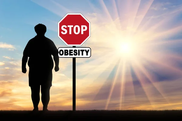 Hombre gordo y un signo de detener la obesidad —  Fotos de Stock