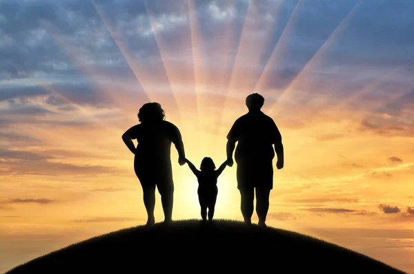 Fett, feta familjen står på en kulle — Stockfoto