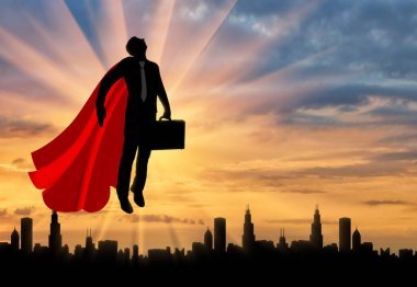 Evrak çantalı bir Süpermen işadamı silüeti