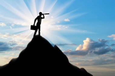 Teleskopla bakarak bir işadamı silüeti