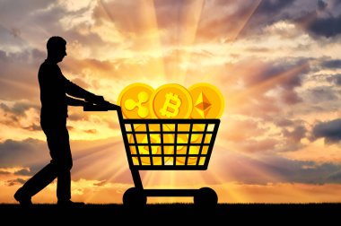 Bir erkek ve bir alışveriş sepeti bir günbatımı üzerinde bir kripto para siluet