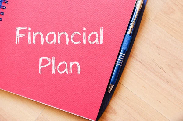 Conceito de texto do plano financeiro no caderno — Fotografia de Stock