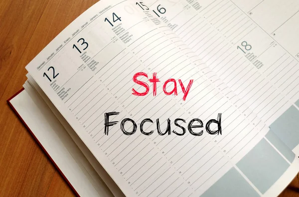 Stay focused concept on notebook — Stock Photo, Image