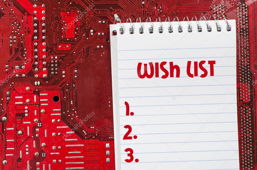 Red old dirty computer circuit board and wish list text concept