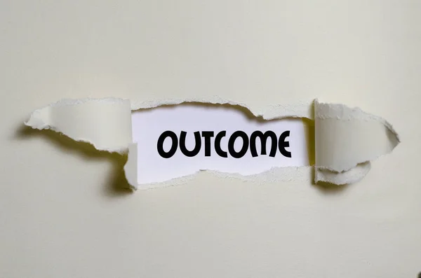 The word outcome appearing behind torn paper — Stock Photo, Image