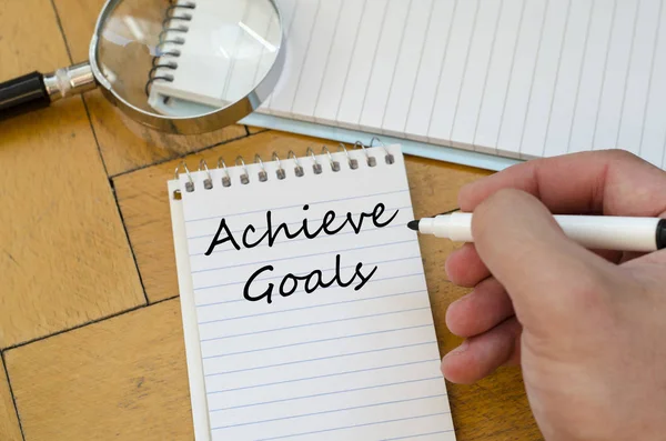 Achieve goals concept on notebook — Stock Photo, Image