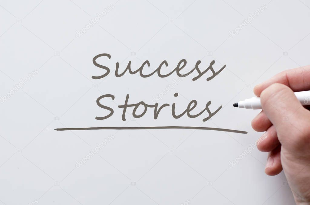 Success stories written on whiteboard