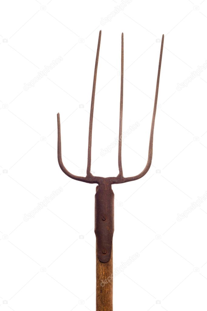 Broken pitchfork on white background