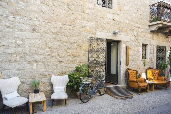 Street with bar terraces in Olbia, Sardinia, Italy
