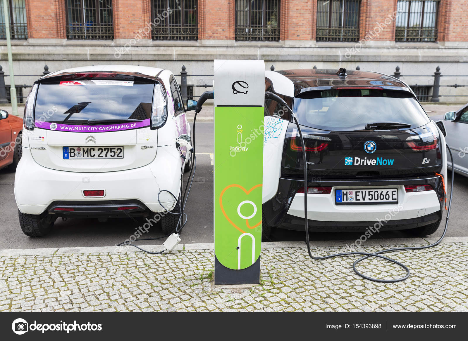Electric cars recharging the batteries in Berlin, Germany – Stock Editorial  Photo © J2R #154393898