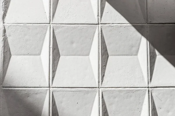 Parede de cimento branco com formas geométricas como fundo — Fotografia de Stock
