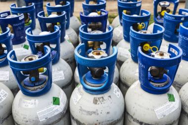 Refrigerant gas cylinders under pressure ready to transport clipart