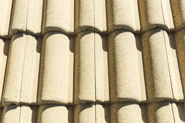 Modern yellow roof tiles on a house