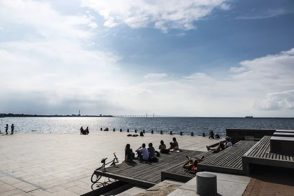 People sunbathing on the promenade in Malmo, Sweden — Stock Photo, Image