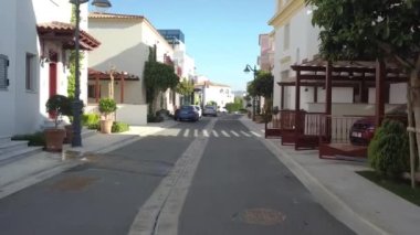 LIMASSOL, CYPRUS - May 4, 2019: Spanning the streets of marina limassol. Low altitude along the street