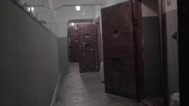 Dark prison corridor, old walls, scary