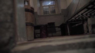 Dirty scary prisoner cell with wooden door