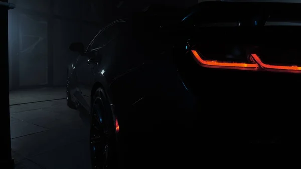 TOMSK, RUSSIA - March 30, 2020: Chevrolet Camaro ZL1 the Exorcist in the garage dark back view, taillights slow forward — 스톡 사진