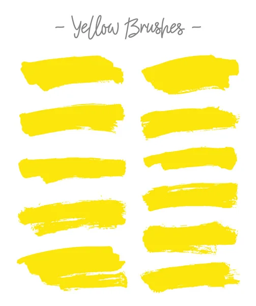 Pincéis vetoriais. Conjunto de tinta amarela — Vetor de Stock