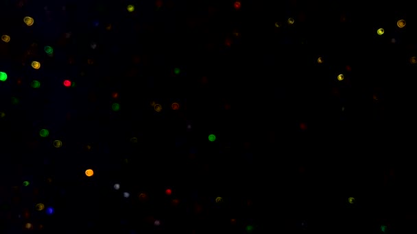 スローモーションビデオ美しい抽象的な背景と色輝く輝くボケ 多色のボケが光るほこりの粒子 ボケの光の粒子の飛行とちらつき — ストック動画