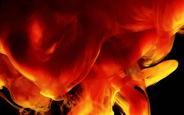Помаранчевий вогненний абстрактний фон. Акварельні чорнила у воді . — стокове фото
