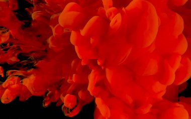 Siyah arka planda kırmızı suluboya mürekkep. Kozmik büyü geçmişi. Kırmızı soyut arka plan. Havalı trend ekran koruyucu.