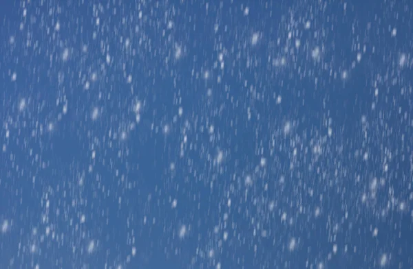 Снег с неба — стоковое фото