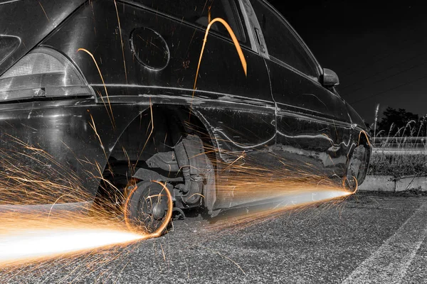 Car wheels with sparks — Stock Photo, Image