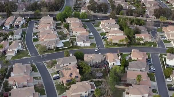 Aerial view over residential suburban city streets in Santa Clarita, California — Stock Video